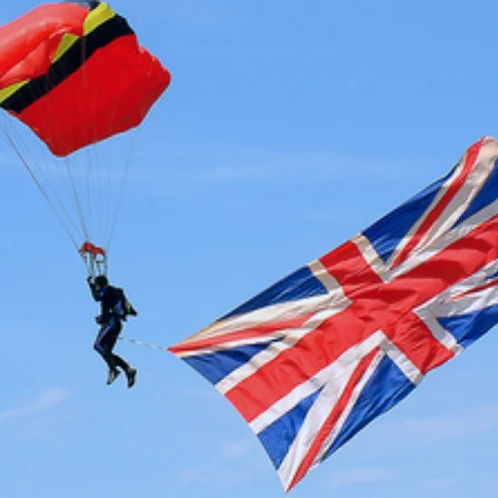Highest-activating image for Skydiver of class Parachute.